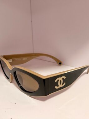CHANEL Two-Tone Cat Eye Sunglasses in Black and Beige